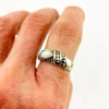 Asymmetrical sterling silver band with teardrop opal and pyramid-cut marcasites