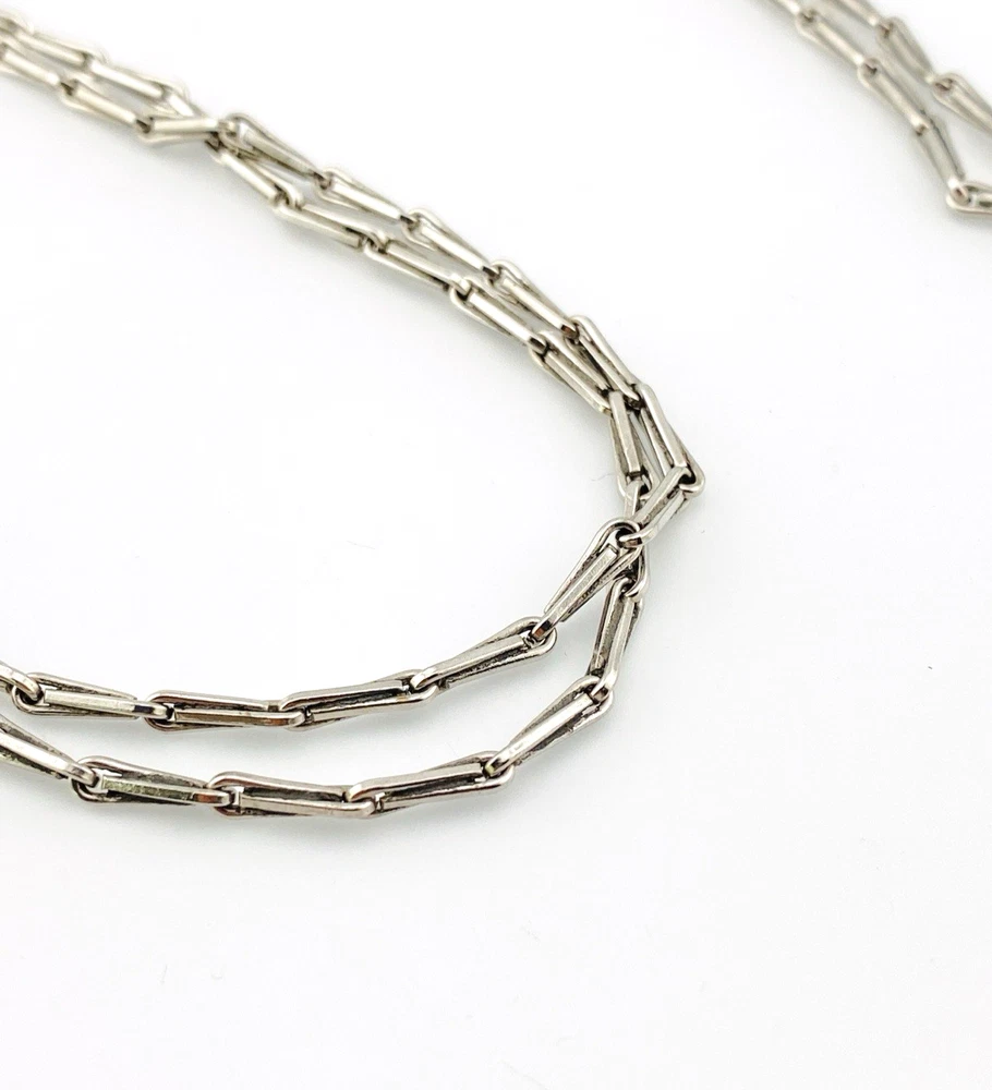 Long silver-tone hayseed-link watch chain necklace with dog clip