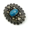 Blue faience scarab set in an ornate Egyptian 800 silver filigree brooch