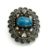 Blue faience scarab set in an ornate Egyptian 800 silver filigree brooch