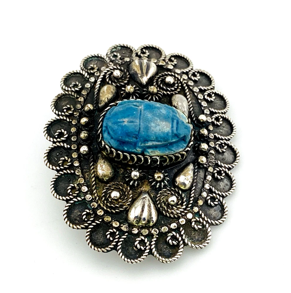 Blue faience scarab set in an ornate Egyptian 800 silver filigree brooch
