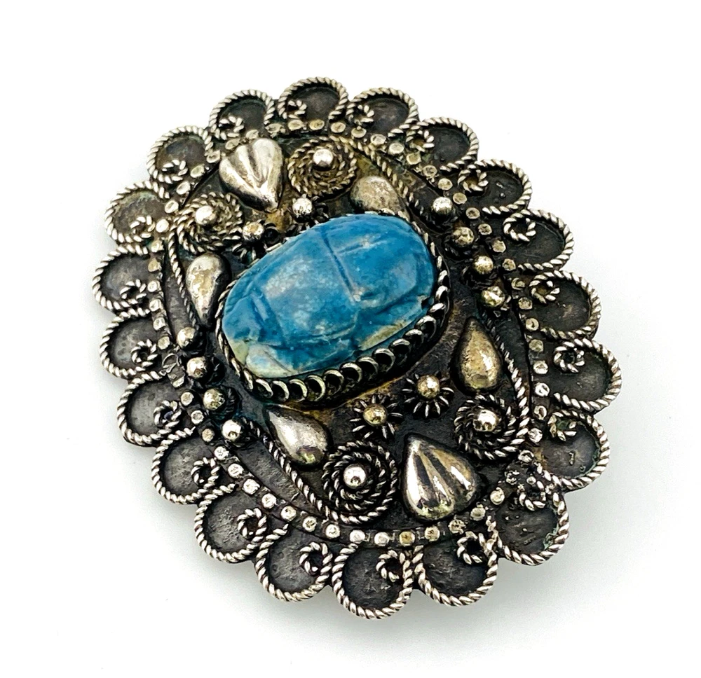 Blue faience scarab set in an ornate Egyptian 800 silver filigree brooch