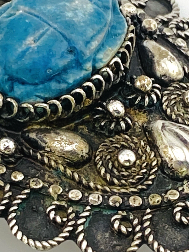 Blue faience scarab set in an ornate Egyptian 800 silver filigree brooch