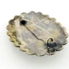 Blue faience scarab set in an ornate Egyptian 800 silver filigree brooch