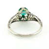 1920s sterling silver filigree ring with a round faceted emerald-green glass stone