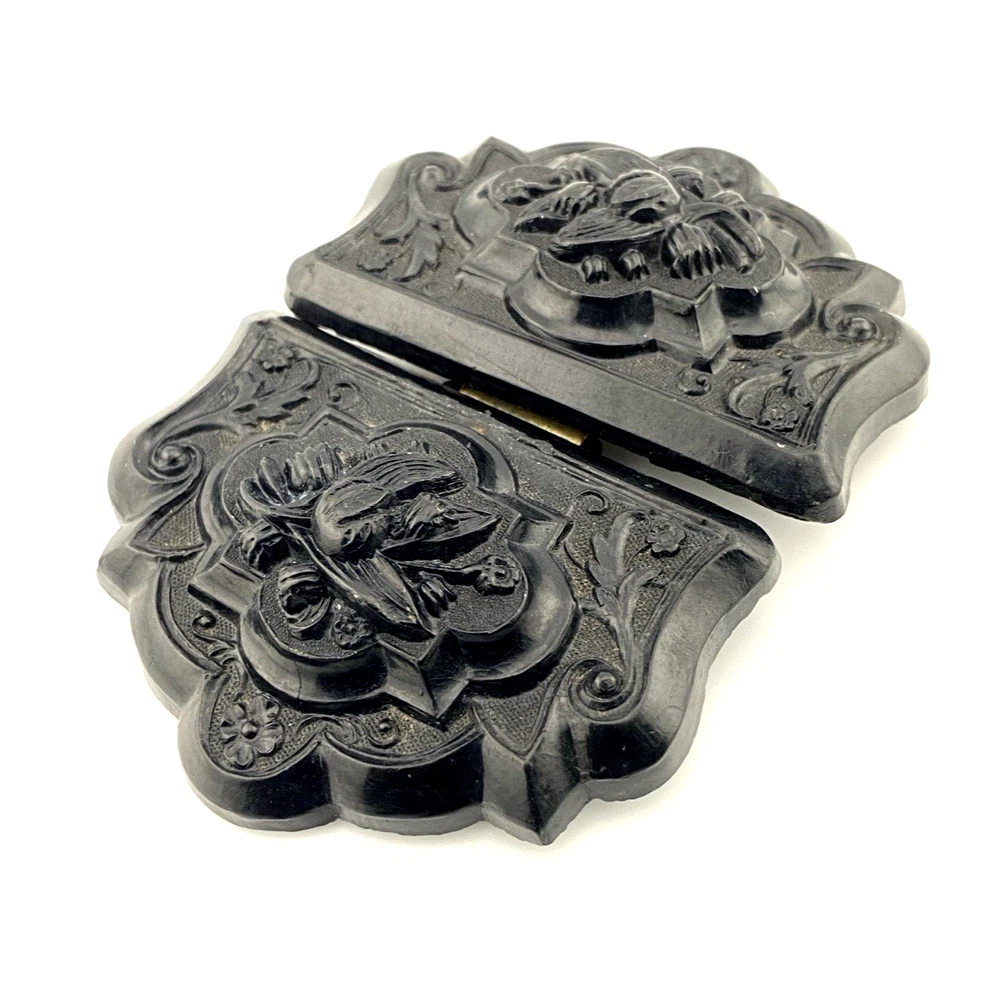 Victorian Whitby jet sash buckle carved with lily-of-the-valley flowers and scrolling foliage