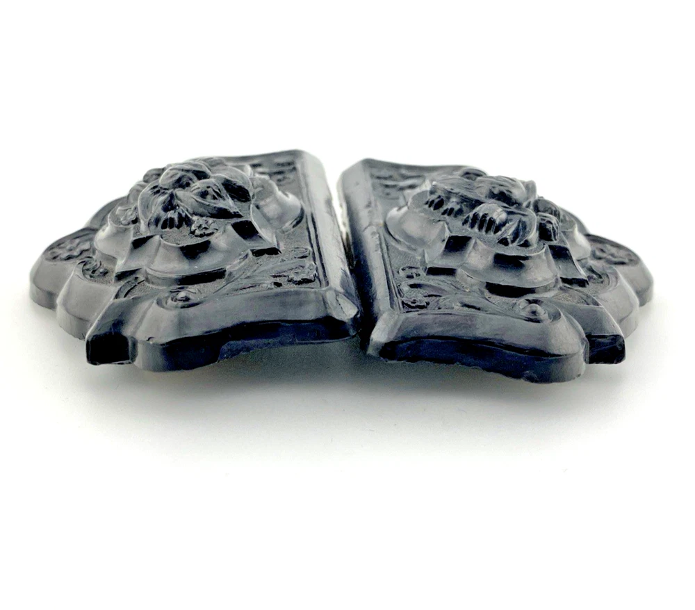 Victorian Whitby jet sash buckle carved with lily-of-the-valley flowers and scrolling foliage