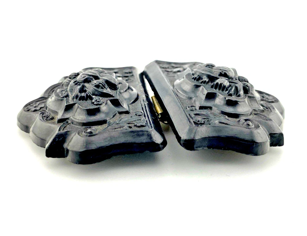 Victorian Whitby jet sash buckle carved with lily-of-the-valley flowers and scrolling foliage