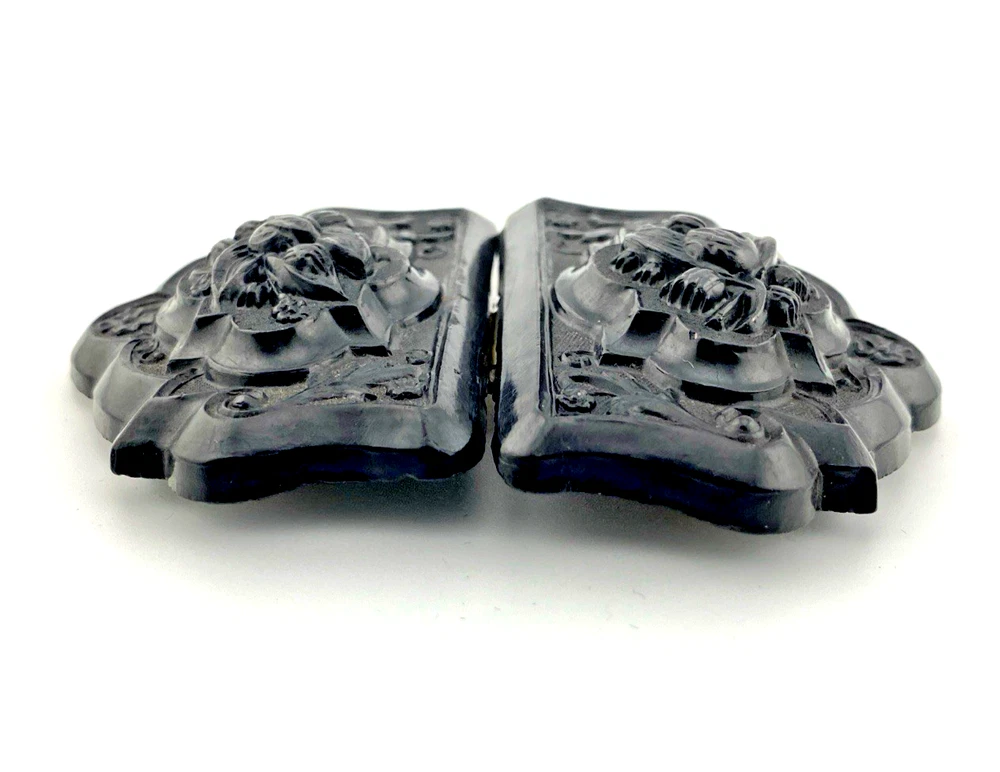 Victorian Whitby jet sash buckle carved with lily-of-the-valley flowers and scrolling foliage