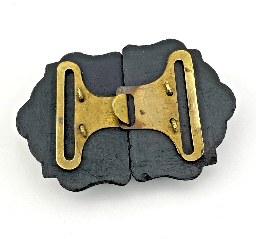 Victorian Whitby jet sash buckle carved with lily-of-the-valley flowers and scrolling foliage