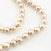 Vintage cream cultured pearl necklace with 5.5mm hand-knotted pearls in a 29-inch endless strand