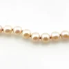 Vintage cream cultured pearl necklace with 5.5mm hand-knotted pearls in a 29-inch endless strand