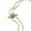 Vintage cultured pearl necklace styled with an antique turquoise and seed-pearl bar pin sold separately