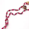 Ruby bead conversion necklace with Victorian mother-of-pearl cornucopia, garnet and antique paste ornament