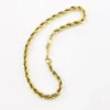 Close-up of the tube clasp and twisted rope links on a vintage gold-filled bracelet