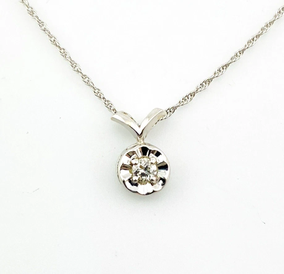 Vintage 14k white gold necklace with a .10-carat diamond in a round illusion setting on a delicate rope chain