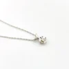 Vintage 14k white gold necklace with a .10-carat diamond in a round illusion setting on a delicate rope chain