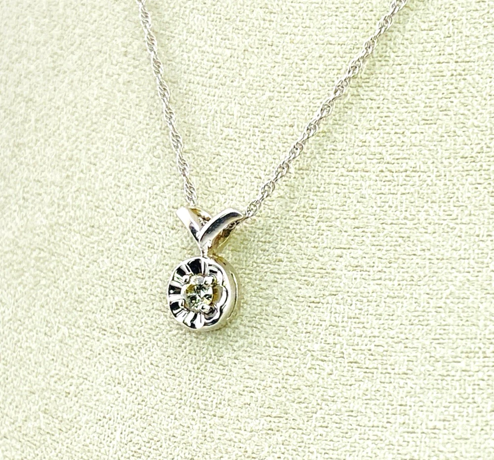 Vintage 14k white gold necklace with a .10-carat diamond in a round illusion setting on a delicate rope chain
