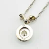 Reverse of the 14k white gold diamond pendant showing the 10 and 14K marks