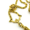 Vintage gold-plated magnifying loupe necklace with an adjustable slide and 30-inch scroll-link chain