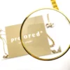 Vintage gold-plated magnifying loupe necklace with an adjustable slide and 30-inch scroll-link chain