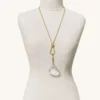 Vintage gold-plated magnifying loupe necklace with an adjustable slide and 30-inch scroll-link chain