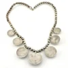 Vintage Navajo-attributed sterling silver necklace with handmade beads and seven graduated half-dome drops