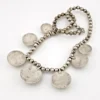 Vintage Navajo-attributed sterling silver necklace with handmade beads and seven graduated half-dome drops