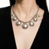Vintage Navajo-attributed sterling silver necklace with handmade beads and seven graduated half-dome drops