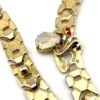 Attributed 1948 Alfred Philippe Trifari honeycomb cravat necklace with moonstone glass clasp