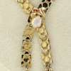 Attributed 1948 Alfred Philippe Trifari honeycomb cravat necklace with moonstone glass clasp