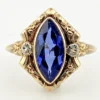 Vintage 1940s 10K gold ring with marquise blue sapphire and white gold illusion accents
