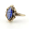 Vintage 1940s 10K gold ring with marquise blue sapphire and white gold illusion accents