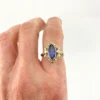 Vintage 1940s 10K gold ring with marquise blue sapphire and white gold illusion accents