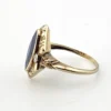 Vintage 1940s 10K gold ring with marquise blue sapphire and white gold illusion accents