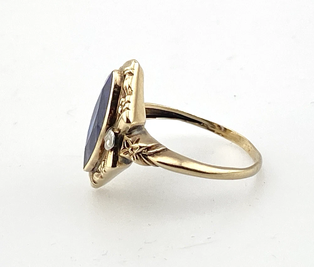 Vintage 1940s 10K gold ring with marquise blue sapphire and white gold illusion accents