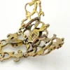 Late-18th-century Georgian gilt-brass necklace centerpiece with natural baroque pearls, red garnet-colored paste glass and pierced Rococo scrollwork