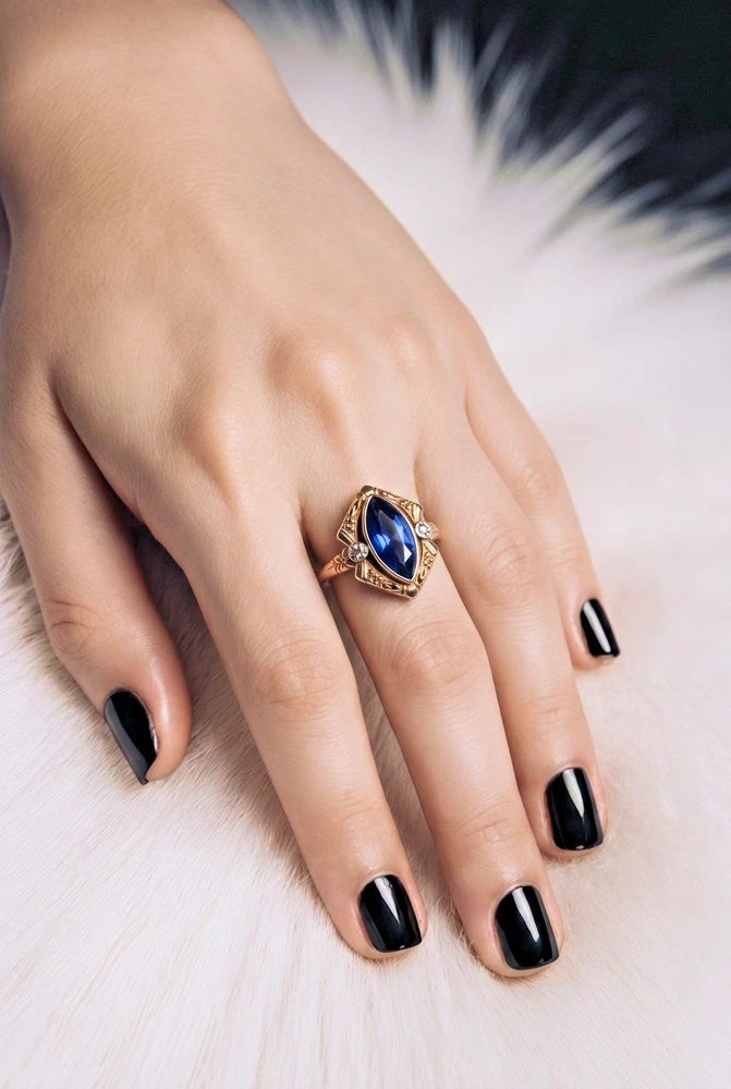 Vintage 1940s 10K gold ring with marquise blue sapphire and white gold illusion accents