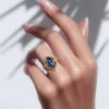 Vintage 1940s 10K gold ring with marquise blue sapphire and white gold illusion accents