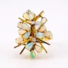 Circa 1960s hand-fabricated 14k gold Atomic starburst ring with natural pear-shaped opals and diamond accents