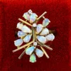 Circa 1960s hand-fabricated 14k gold Atomic starburst ring with natural pear-shaped opals and diamond accents