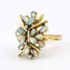 Circa 1960s hand-fabricated 14k gold Atomic starburst ring with natural pear-shaped opals and diamond accents
