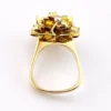 Circa 1960s hand-fabricated 14k gold Atomic starburst ring with natural pear-shaped opals and diamond accents