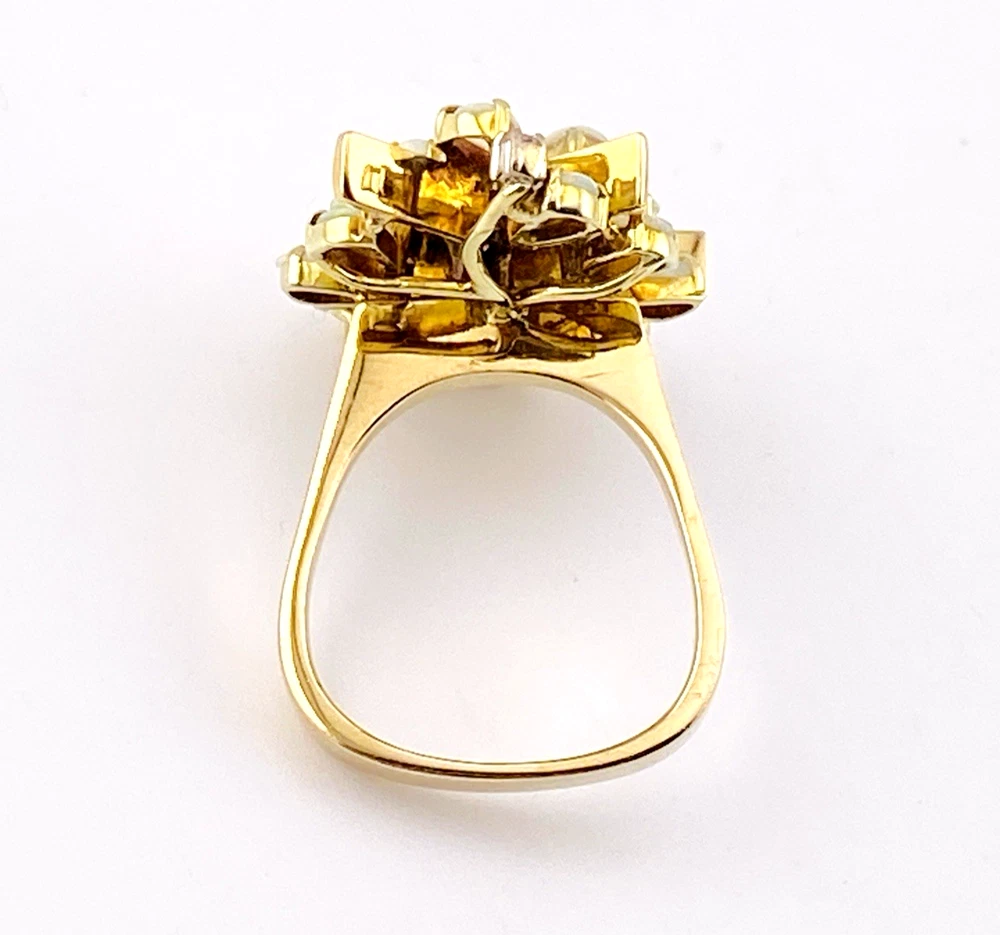 Circa 1960s hand-fabricated 14k gold Atomic starburst ring with natural pear-shaped opals and diamond accents