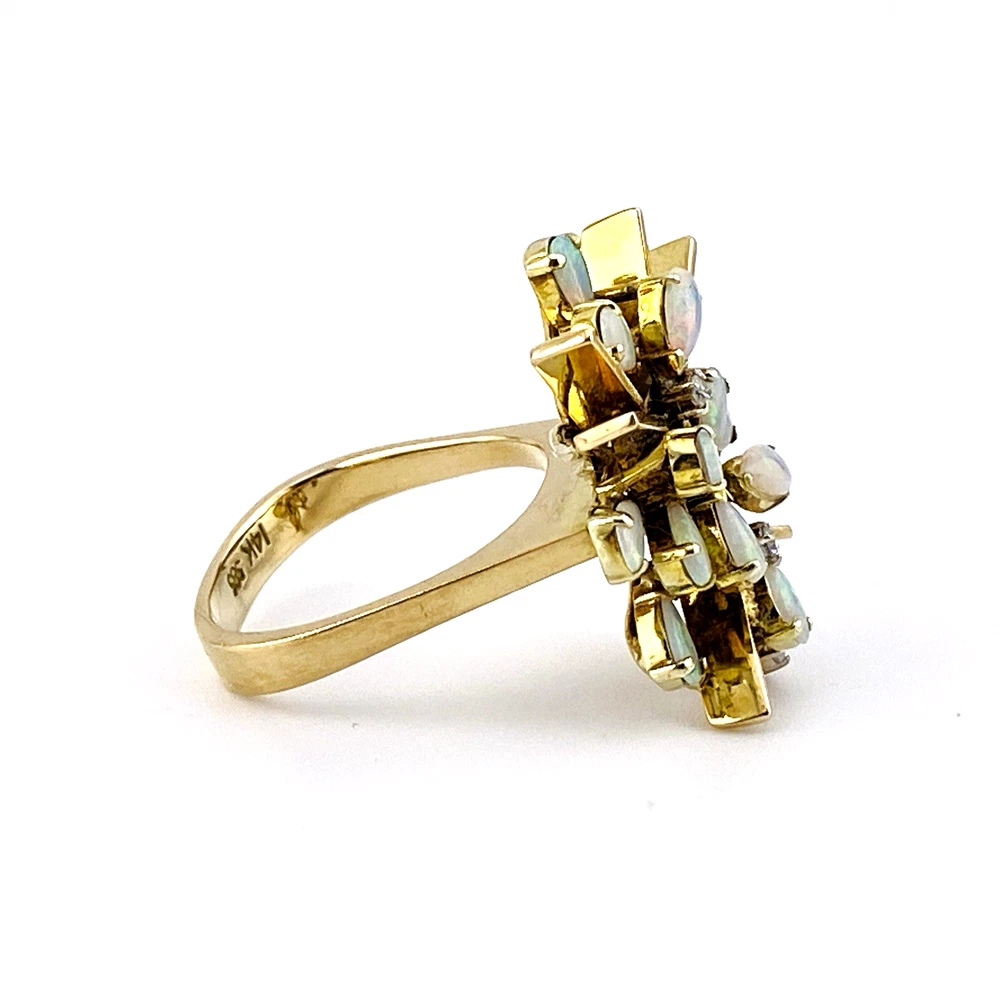 Circa 1960s hand-fabricated 14k gold Atomic starburst ring with natural pear-shaped opals and diamond accents