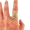 Circa 1960s hand-fabricated 14k gold Atomic starburst ring with natural pear-shaped opals and diamond accents