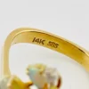 Circa 1960s hand-fabricated 14k gold Atomic starburst ring with natural pear-shaped opals and diamond accents