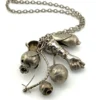 Vintage Brazilian silver-tone Penca de Balangandãs necklace with six dimensional charms and protective figa hand