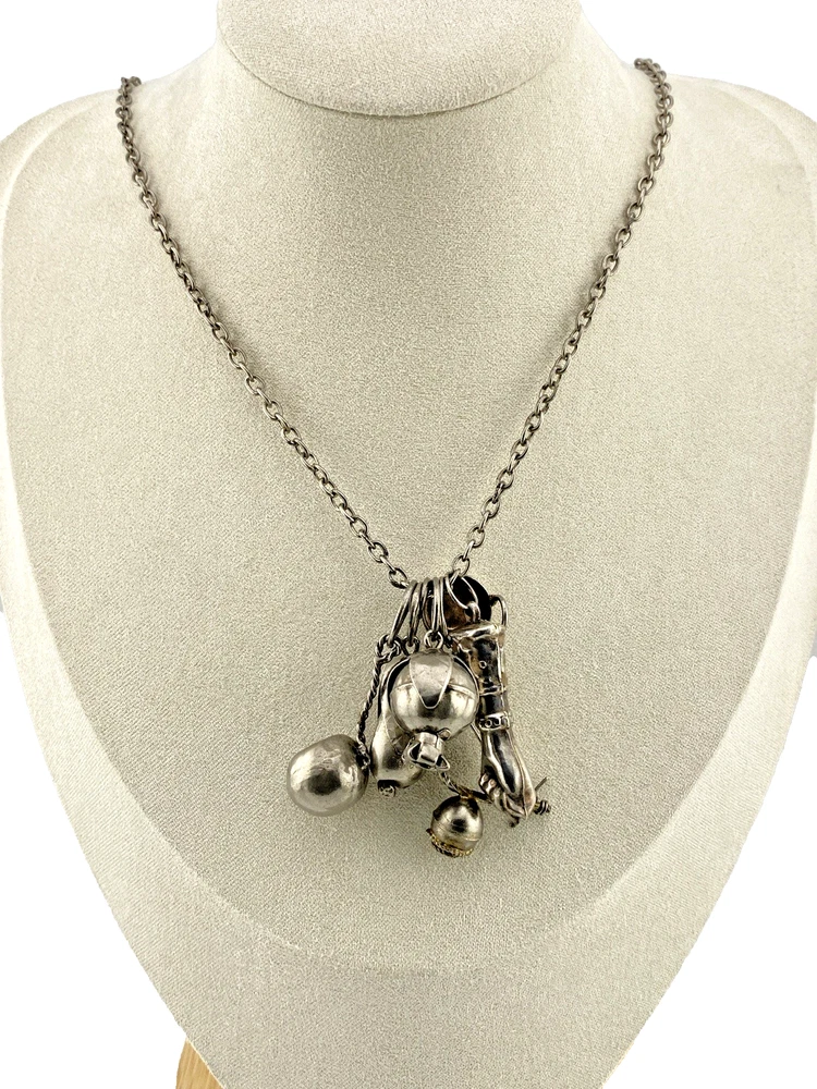 Vintage Brazilian silver-tone Penca de Balangandãs necklace with six dimensional charms and protective figa hand