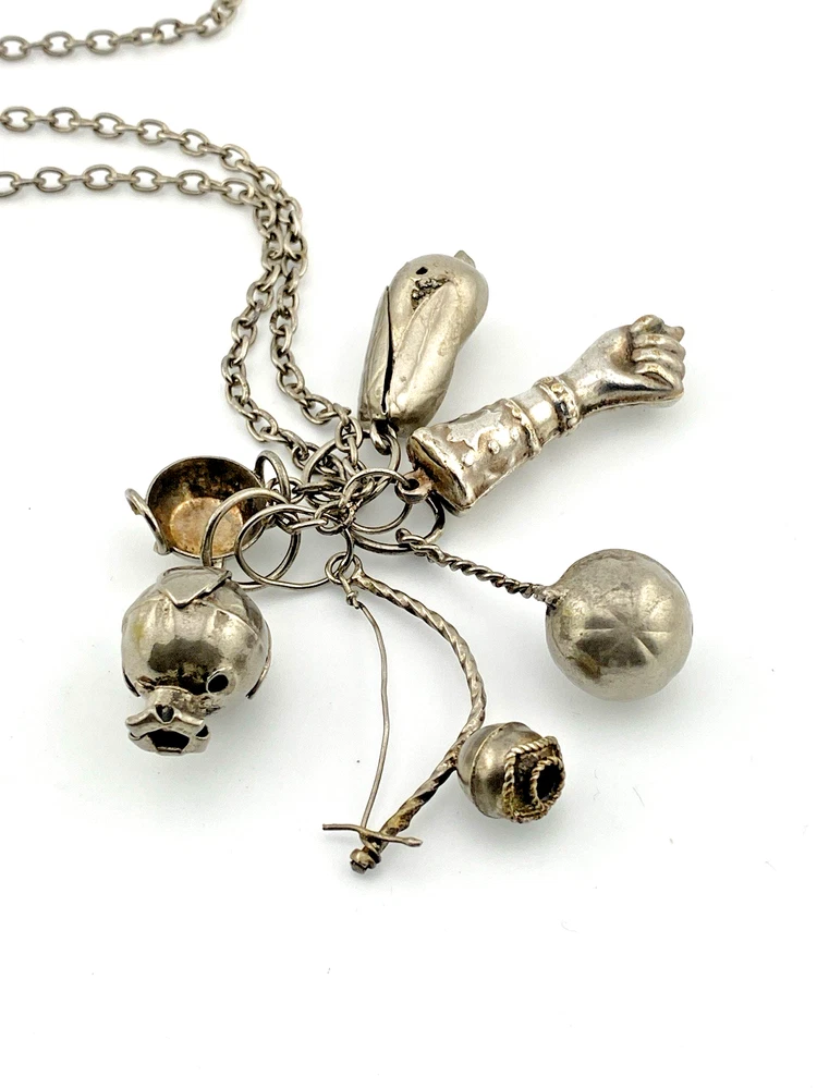 Vintage Brazilian silver-tone Penca de Balangandãs necklace with six dimensional charms and protective figa hand